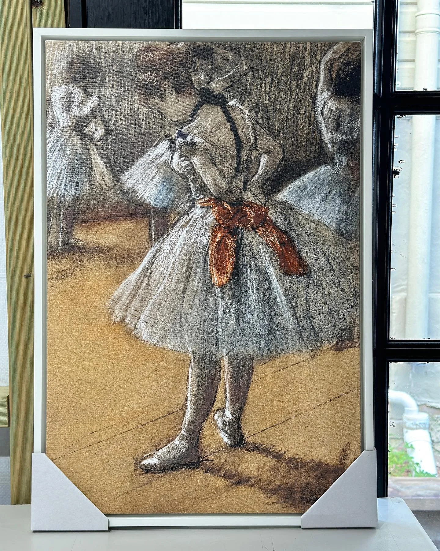 This went from a nice looking rolled up canvas to a beautiful piece of wall art.