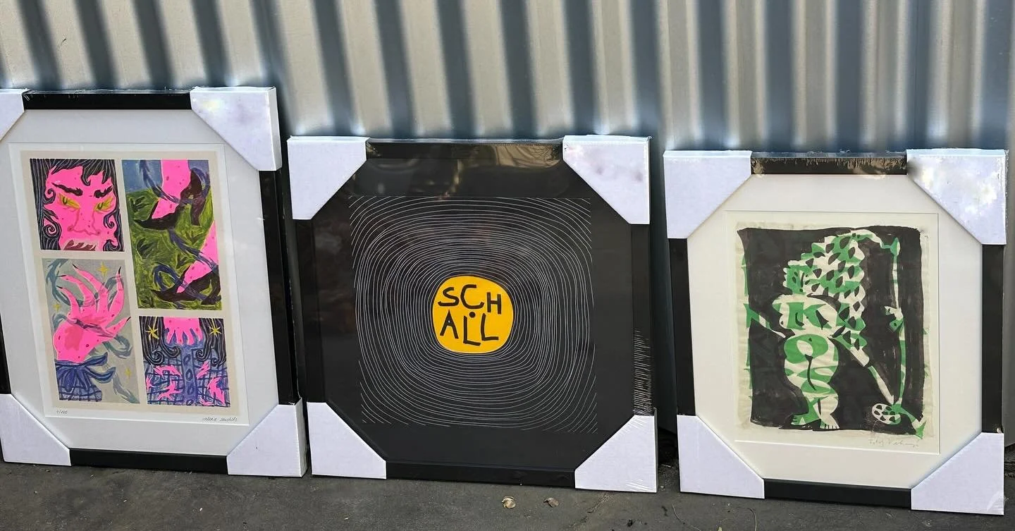 The group of travel collections all framed.