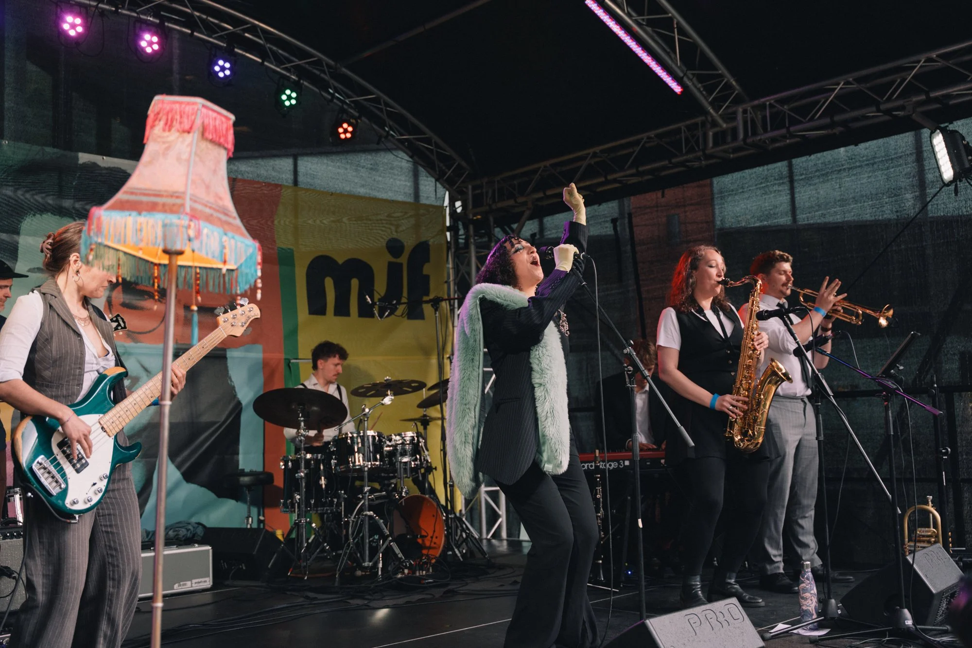 six members of the band Rivkala standing on stage at manchester jazz festival