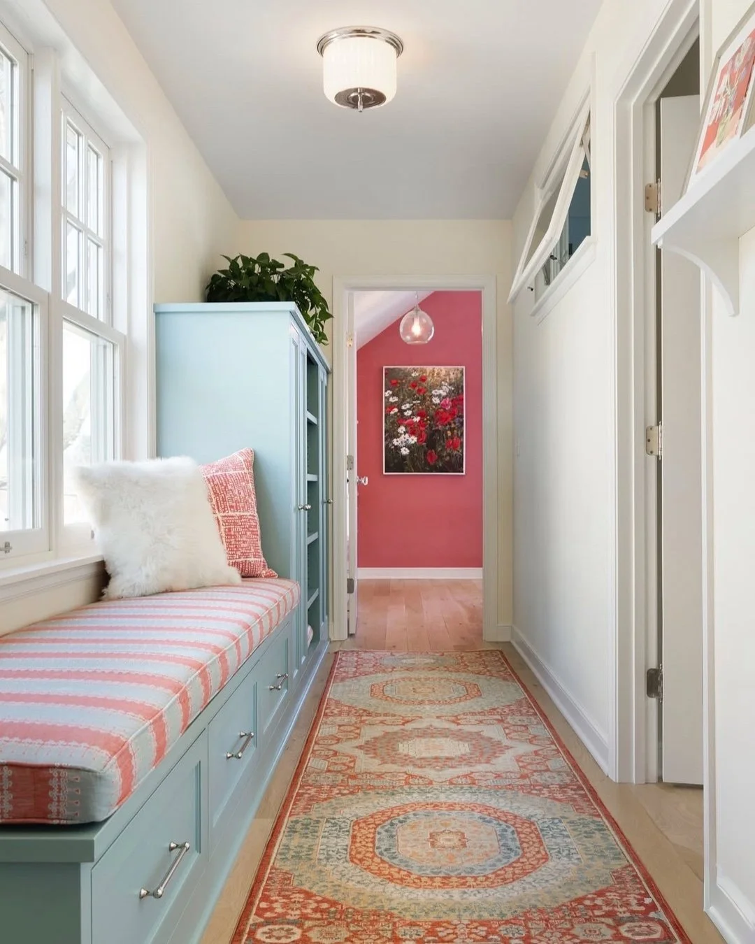 Thanks to Christine from of @inunisondesign for including us in this fun project! We love the bright, cheery colors in this home. Pictured in this cute hallways is a bench cushion custom crafted in our Excelsior workroom. 🩵