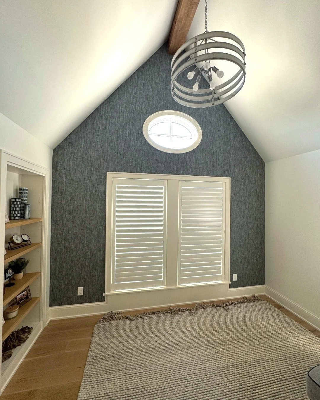 We are loving the textured accent wall in this cozy loft. It's the perfect place for kiddos to hide away with a good book or game! The wallpaper is from @thisbaut_1886, sourced and installed by Union Place Interiors. We are grateful to have been incl
