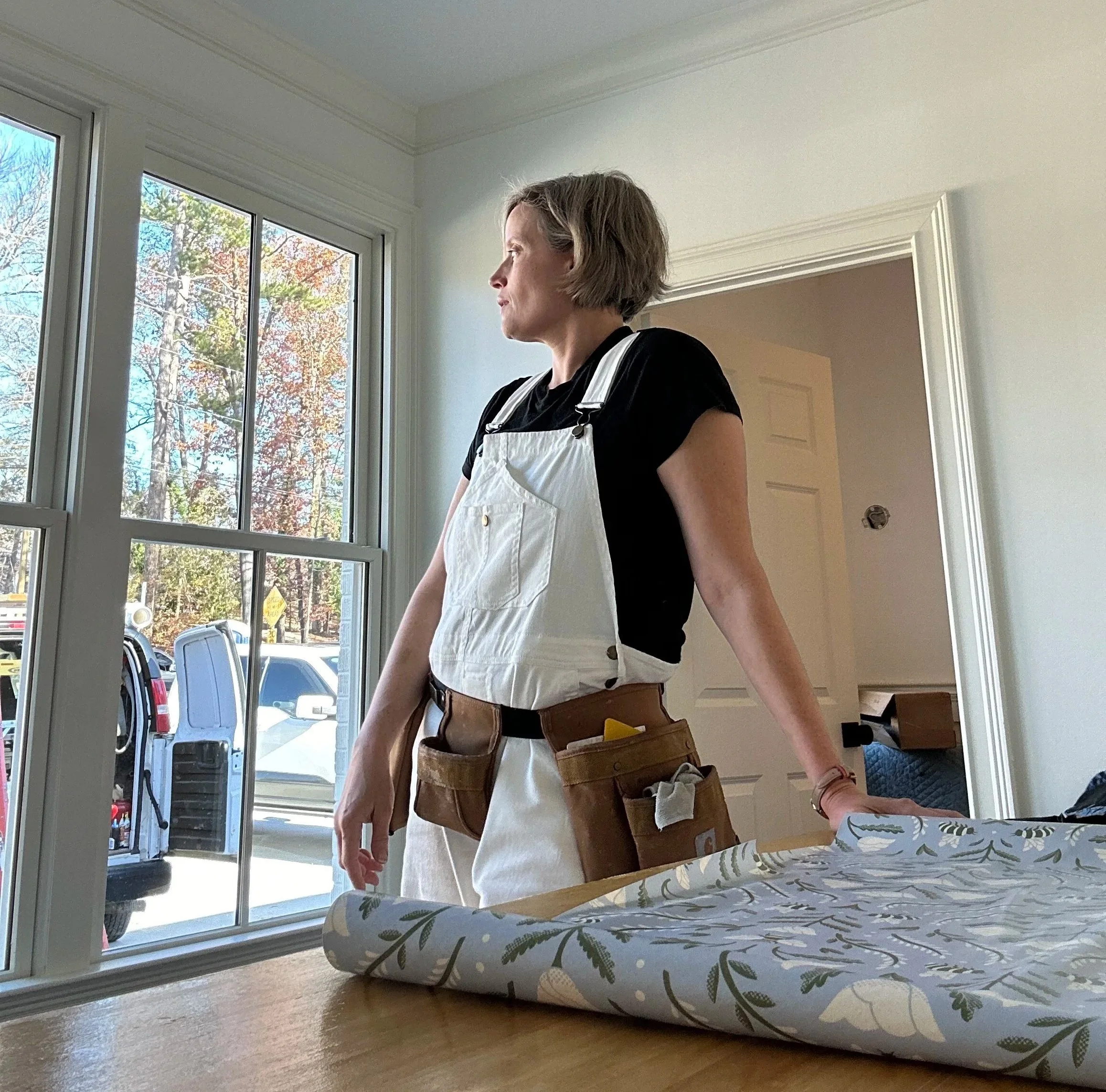 Picture of a wallpaper installer on the job site in 30606 and 30642