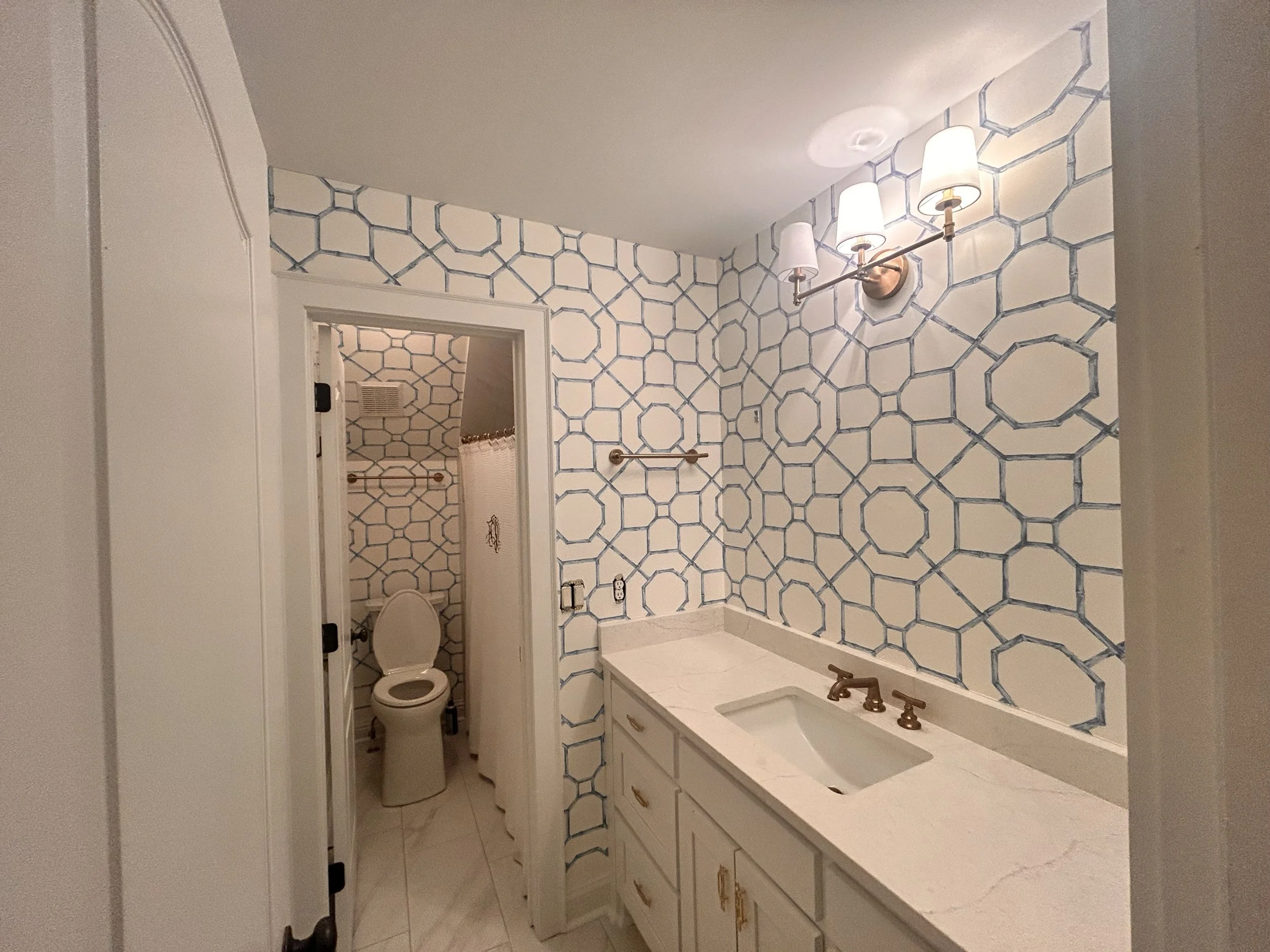 Blue and White Thibaut wallpaper installed in bathroom by Athens Georgia Installer Second Rodeo Wallpaper 
