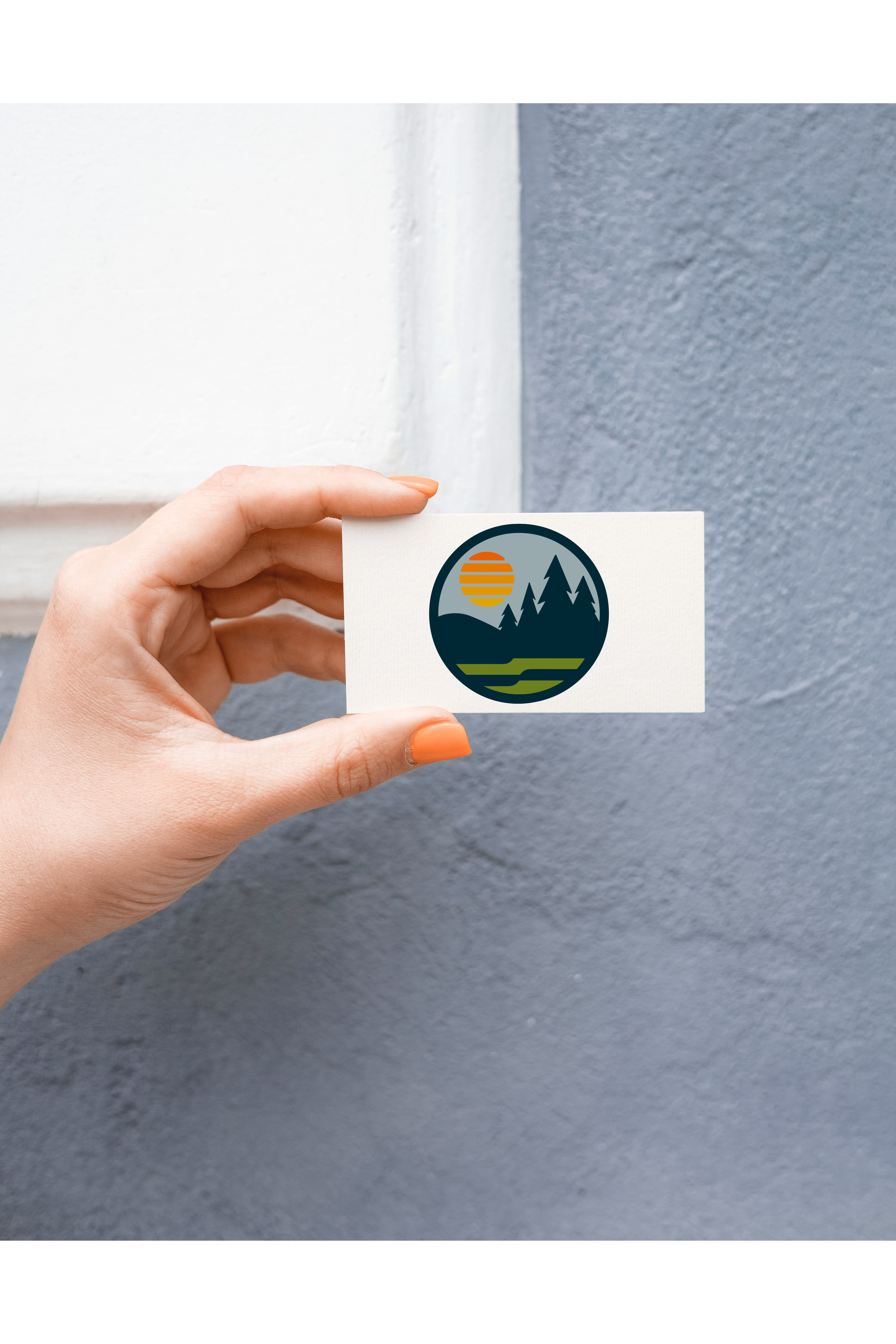 hand holding business card
