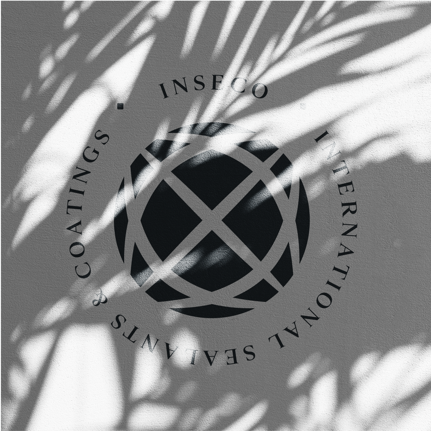 Inseco Inc. logo on concrete wall in the shade