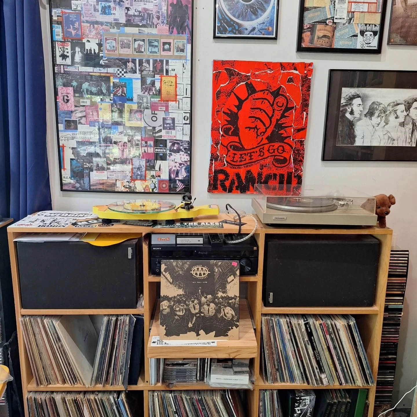 I've got work in the kiln, and glaze is drying on wares. Time for music!
.
Today, I rearranged my music media (not pictured: many hundreds of CDs). I got a new receiver and connected both turntables--a silver one my mom gave me decades ago, and an aw