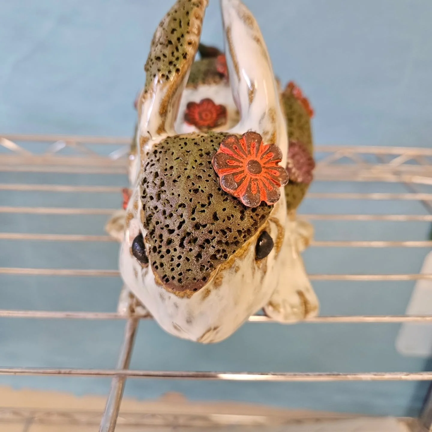 Bunny Garden Guardian, with Bluebells, moss, and flowers growing on it. A sneak peek at the work I've been making for my MA Show &quot;Lifecycles: Pillars of Growth&quot;. It explores life, death, and our mortal seasons through the lens of a garden. 