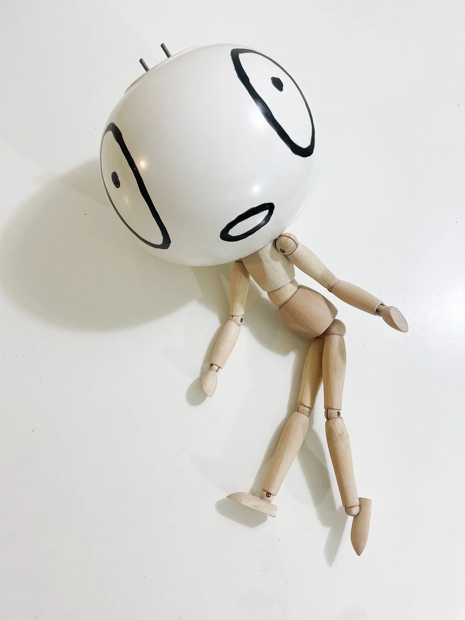 Untitled (vase head), 6h x 15w x 6d, adjustable wooden mannequin, round ceramic vase, bake-on paint, threaded rod, nuts, washers, glue, 2026