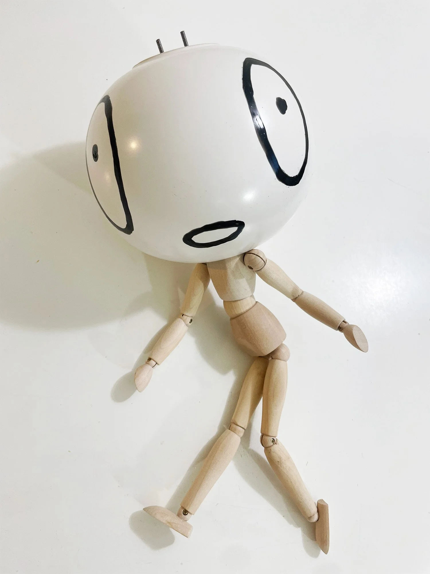 Untitled (vase head), 6h x 15w x 6d, adjustable wooden mannequin, round ceramic vase, bake-on paint, threaded rod, nuts, washers, glue, 2026