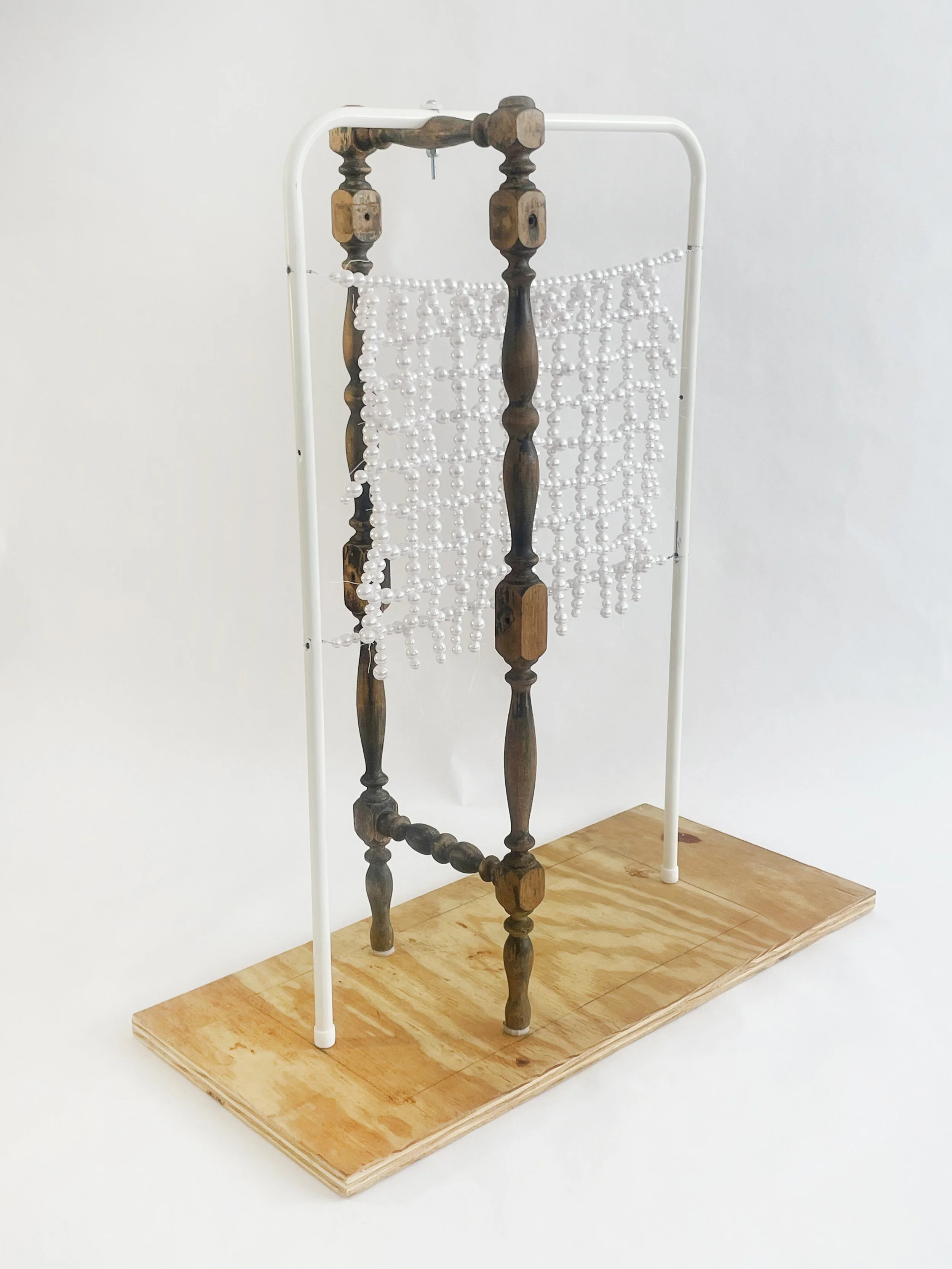 Untitled (radiator), 2026, 28h x 24x x 11d - salvaged turned wood, Ikea aluminum legs, plastic pearl beads, found plywood, wire, thread, thread rod