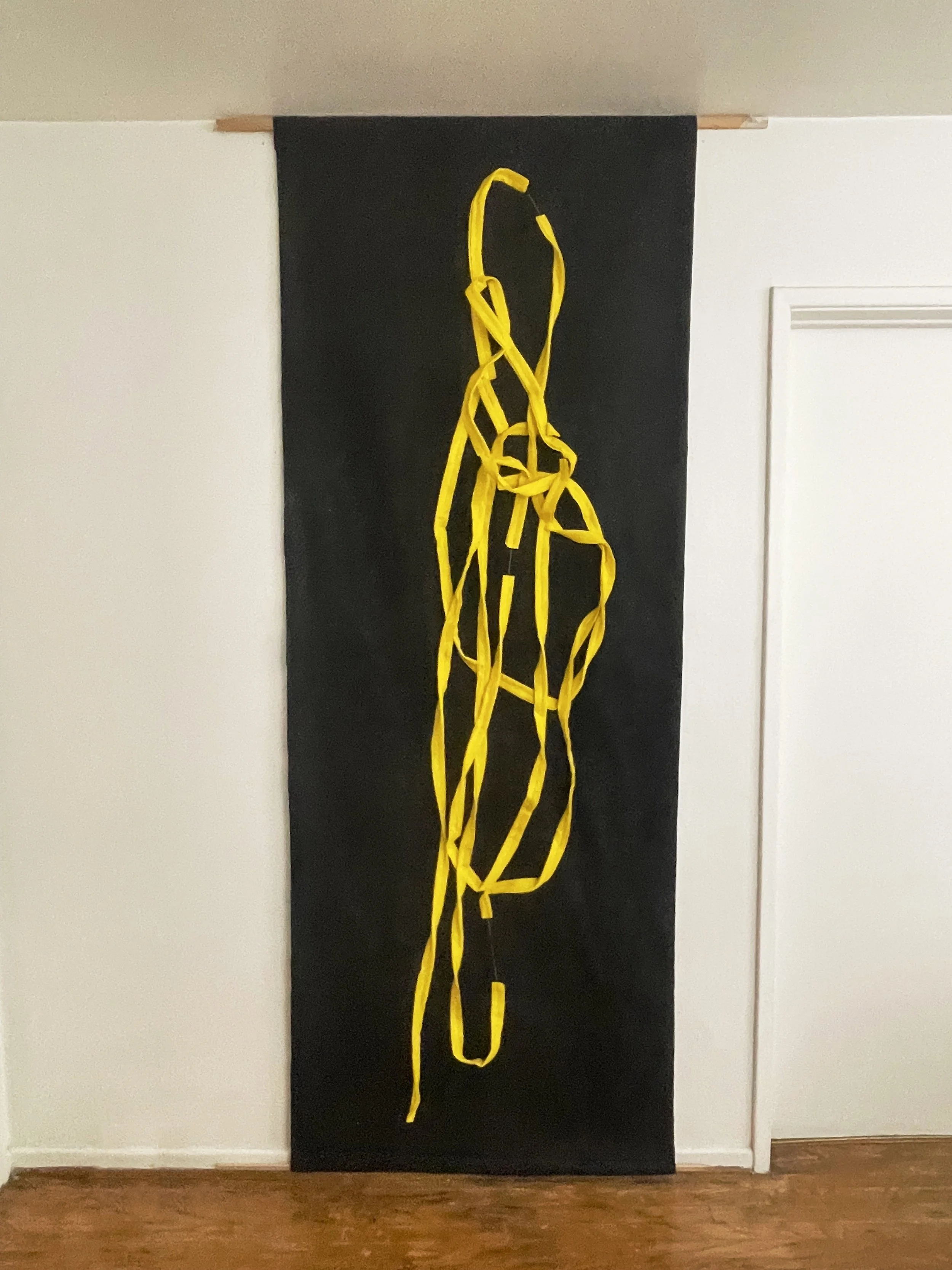 Untitled (the spaghetti tapestry), 2018-2026, 8’ x 3’, black sparkle felt, yellow felt, thread, cotton edging. This was a piece I pinned together in my studio off Brady St. in Milwaukee in 2018. This summer I finished it. Although it is from a differ