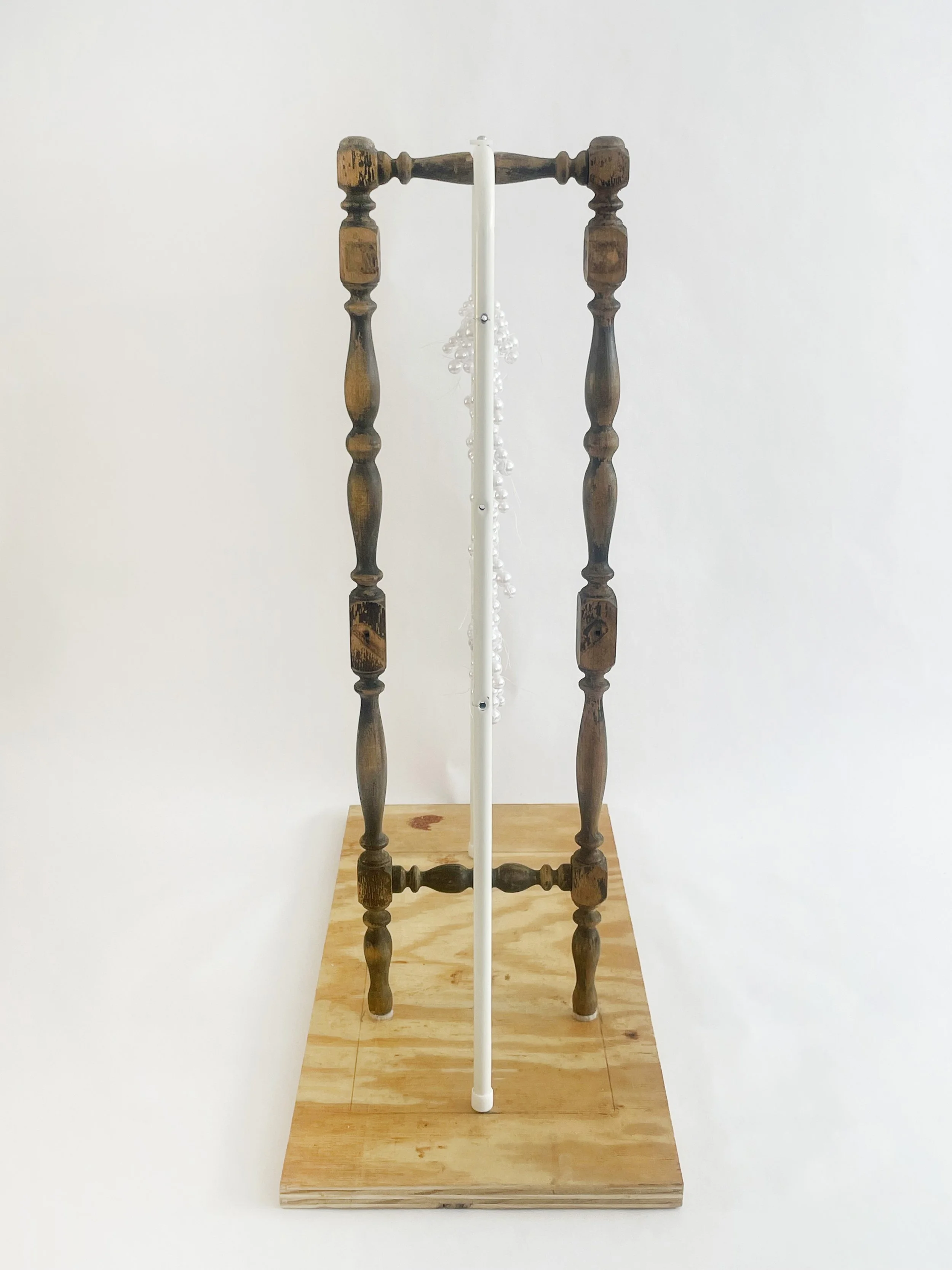 Untitled (radiator), 2026, 28h x 24x x 11d - salvaged turned wood, Ikea aluminum legs, plastic pearl beads, found plywood, wire, thread, thread rod