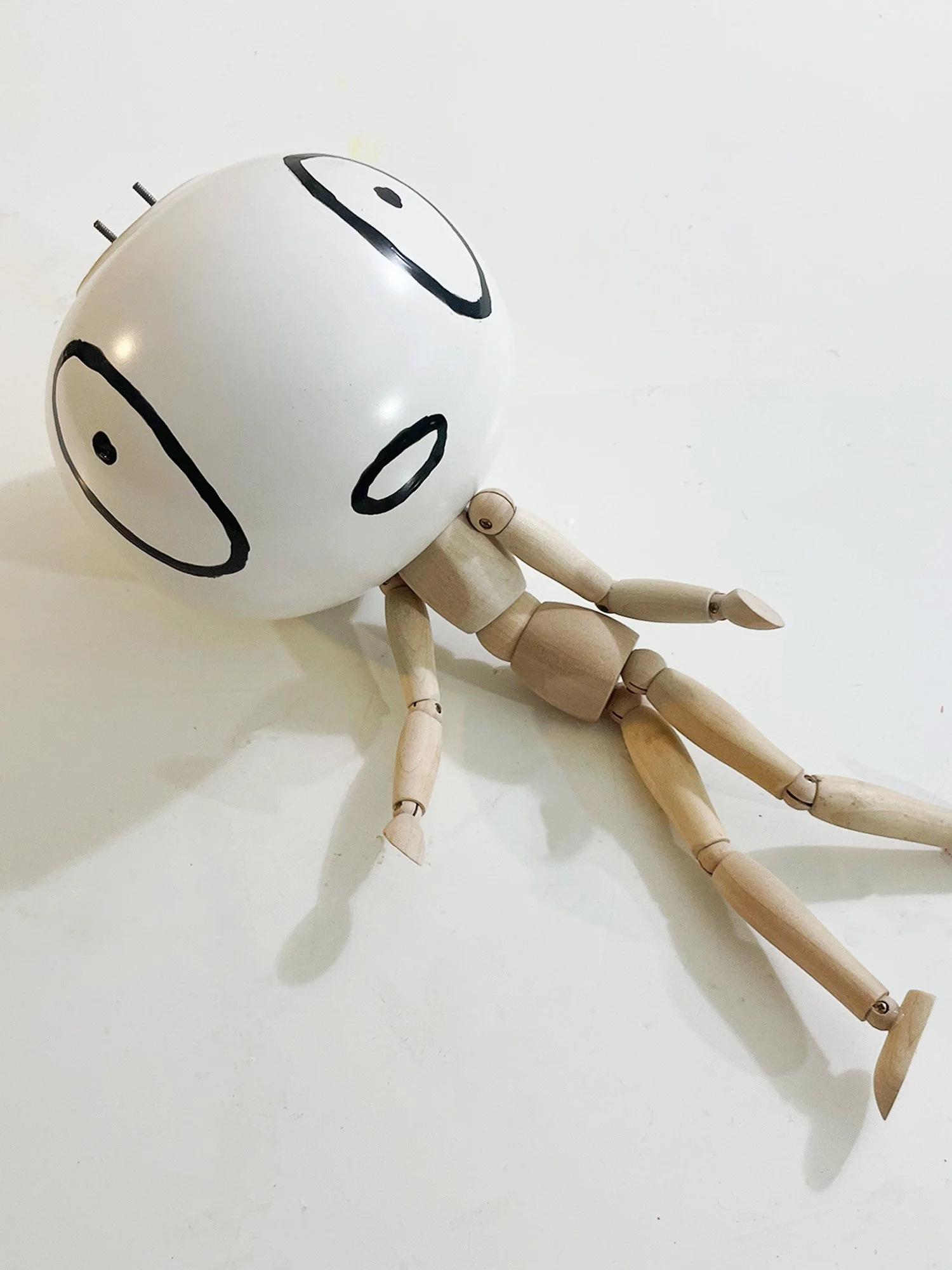 Untitled (vase head), 6h x 15w x 6d, adjustable wooden mannequin, round ceramic vase, bake-on paint, threaded rod, nuts, washers, glue, 2026