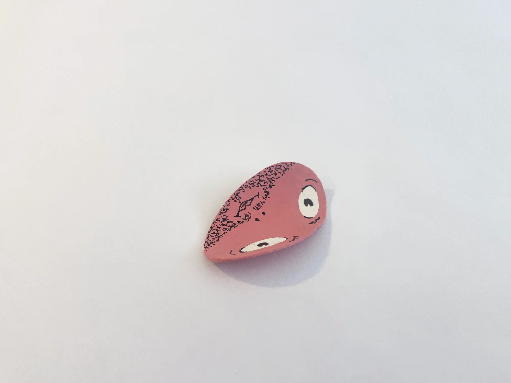 Floppy Face #2, 3 1/4 x 1 3/4, toilet paper tube, acrylic, medium, acrylic, gouache, pigment ink, ColorAid paper, glue, 2026 