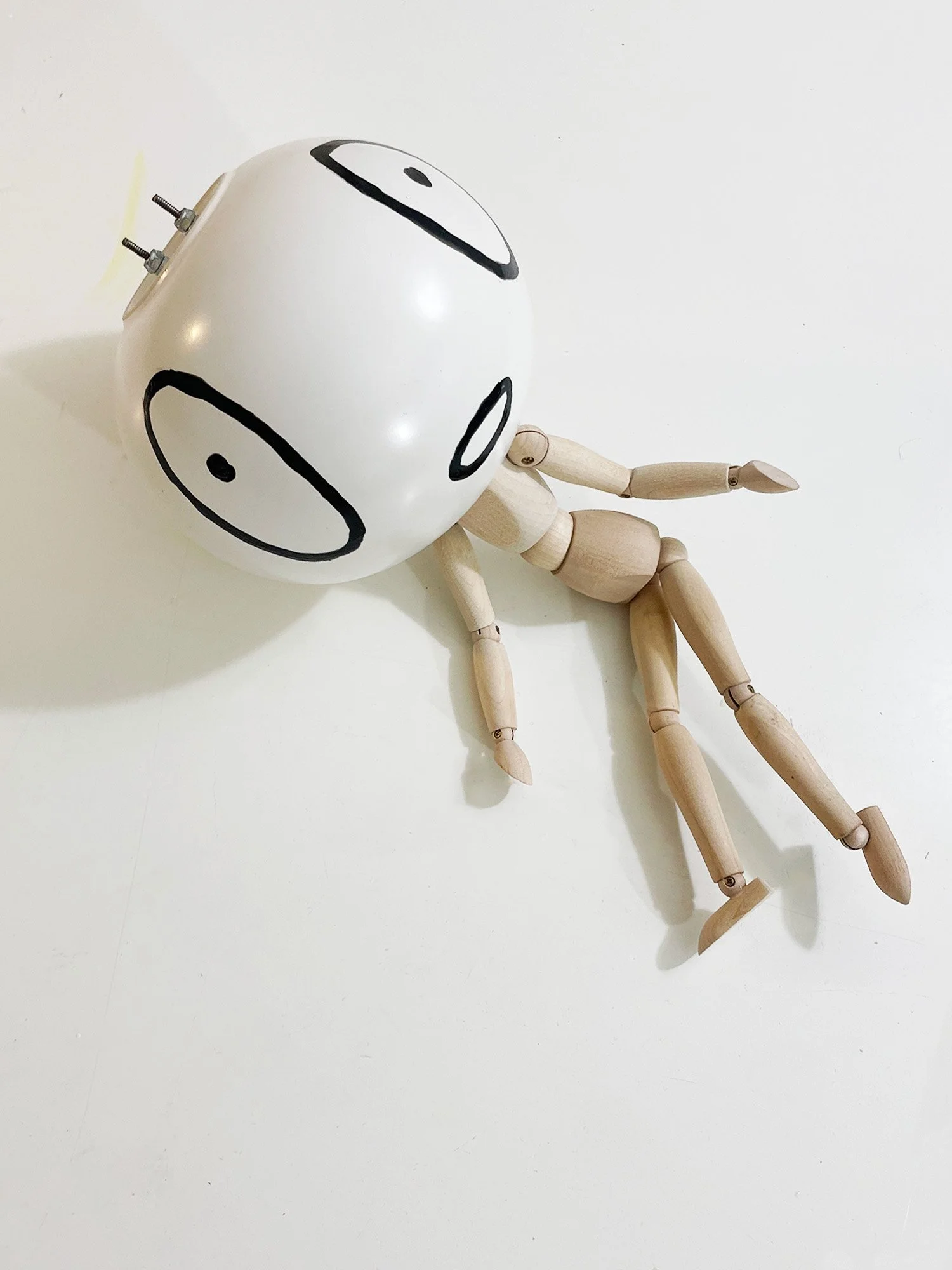 Untitled (vase head), 6h x 15w x 6d, adjustable wooden mannequin, round ceramic vase, bake-on paint, threaded rod, nuts, washers, glue, 2026