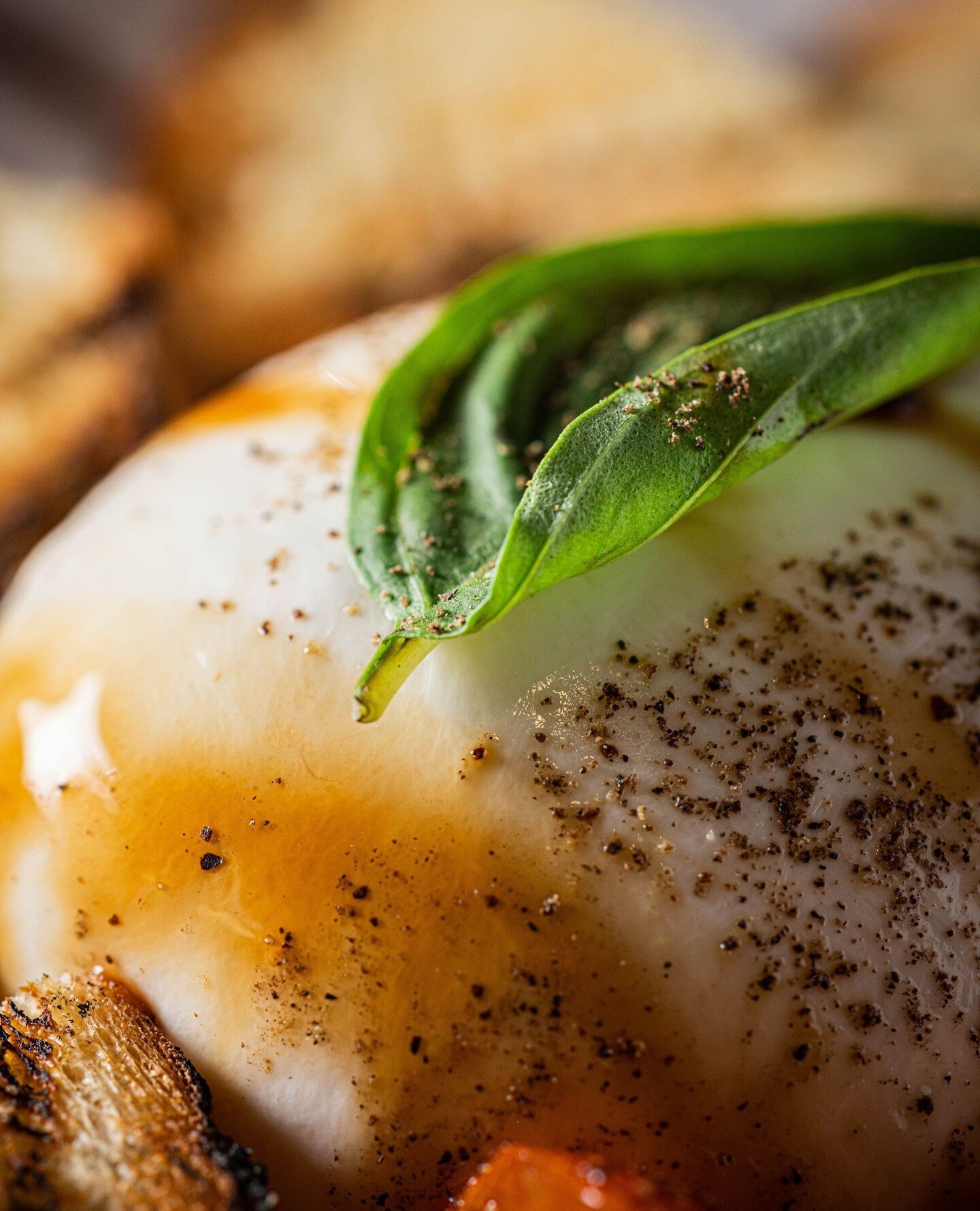 Say cheese and savor the moment with our irresistible Burrata at Rosewood Grill! 📸🧀