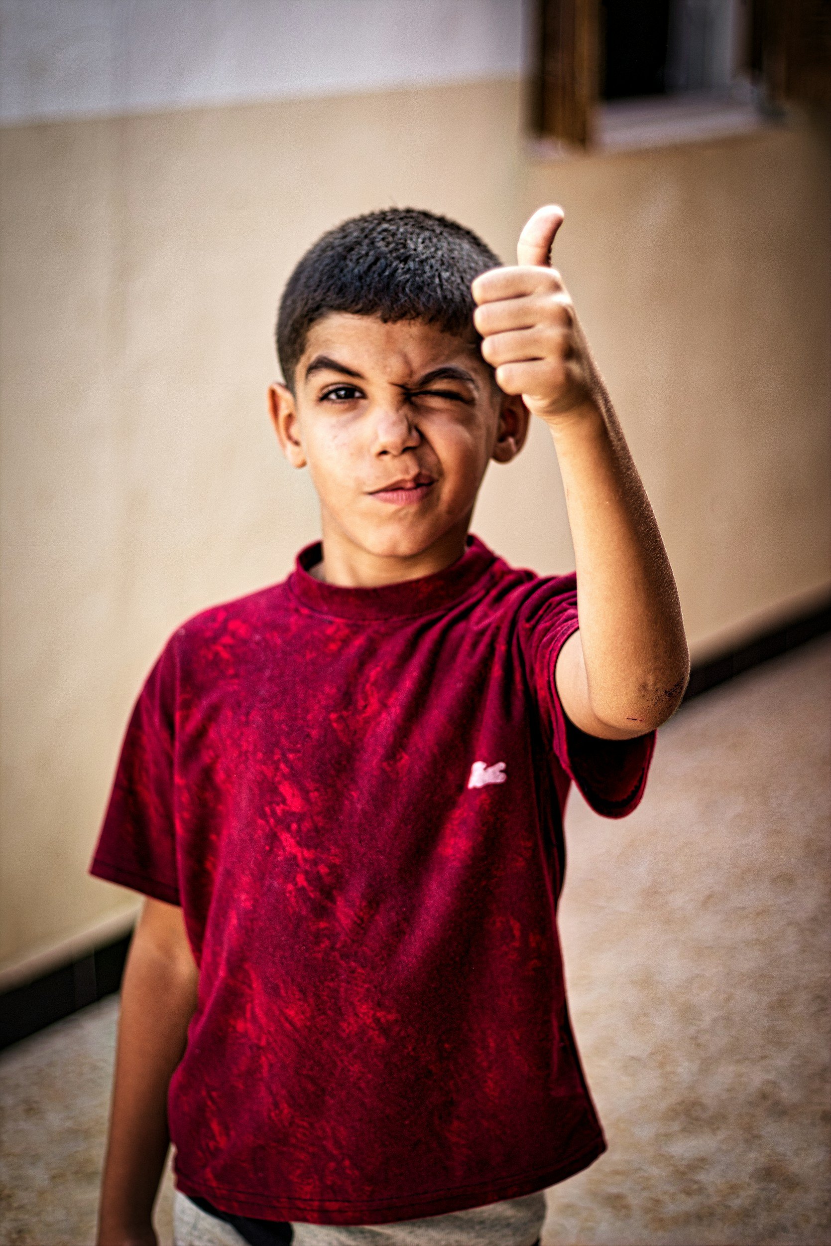 Boy giving thumbs up