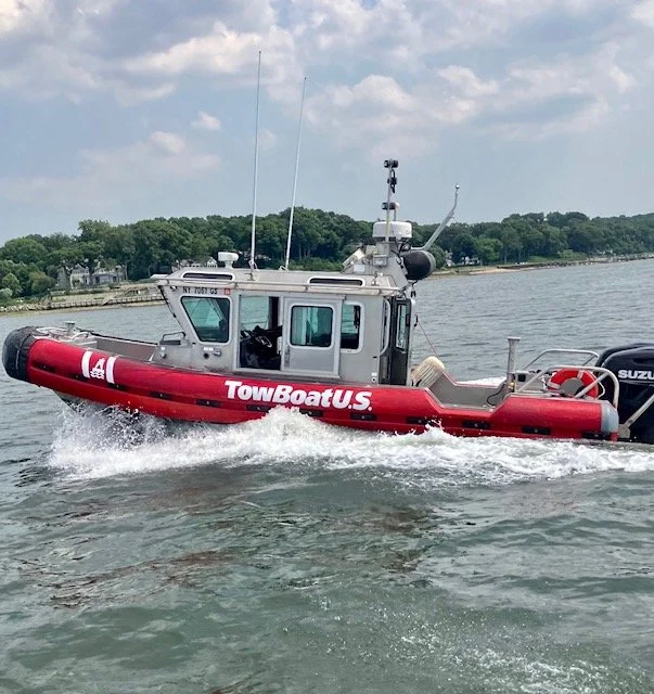 TowboatUS safeboat racing to tow a member
