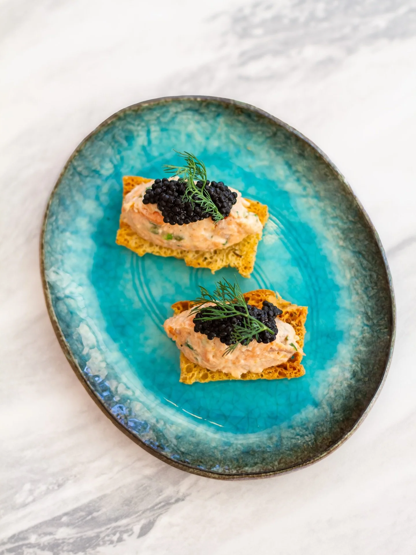 Crisp crostini, salmon rillettes, lemon and a little avruga caviar on top.
The kind of dish that sets the tone for the meal ahead.