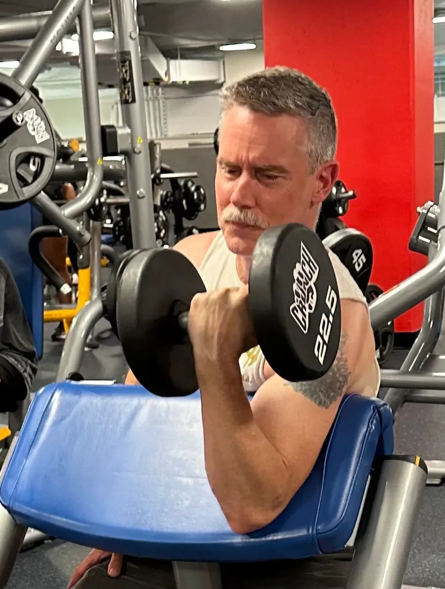 Ed started training at 52-years old and demonstrates excellent bicep curl technique.