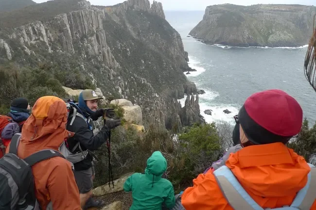 Coach Josh Wood Telling tales of the light keepers while guiding on the Southern Hemisphere’s tallest sea cliffs.