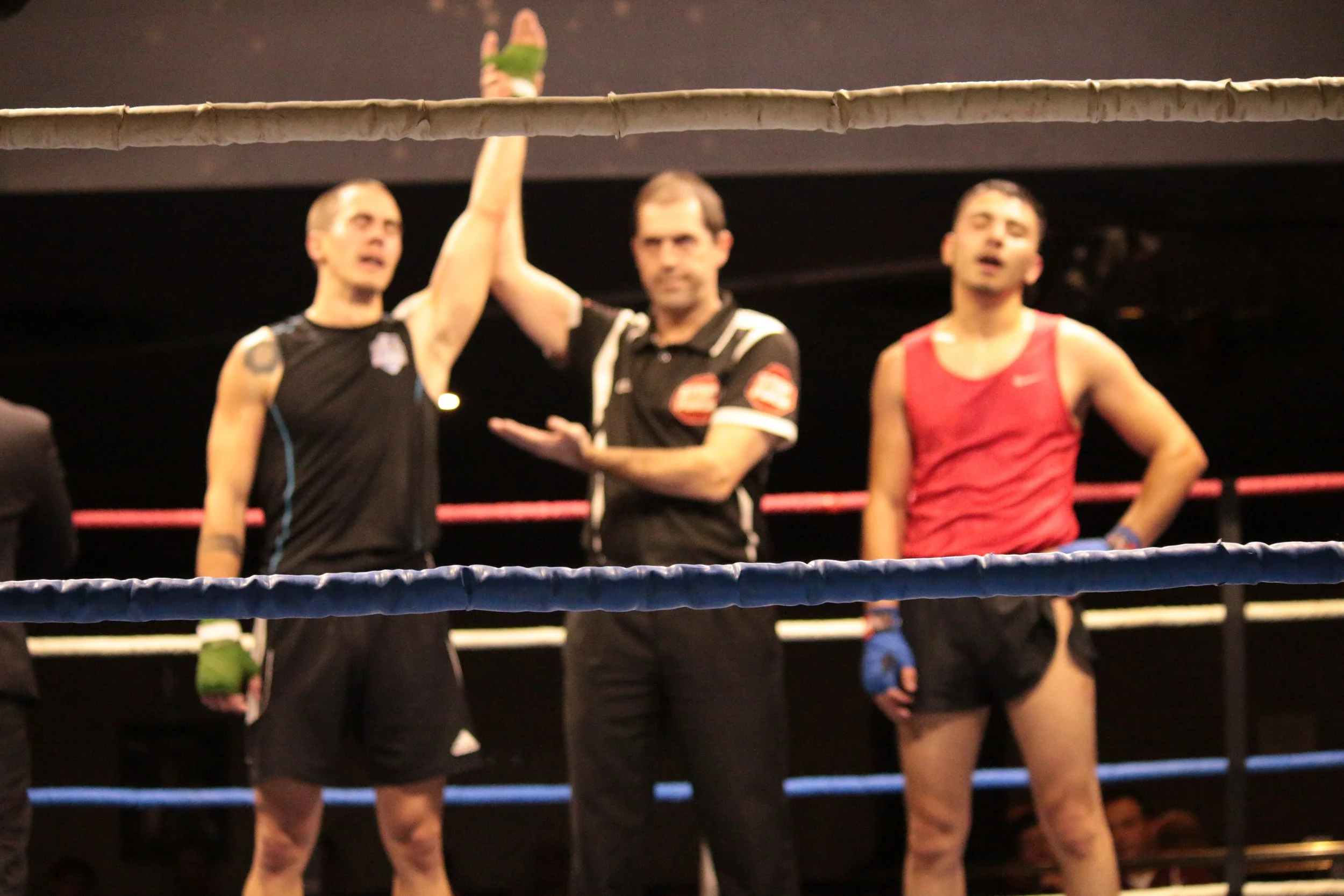 Coach Josh claims victory during an amateur boxing match in Melbourne