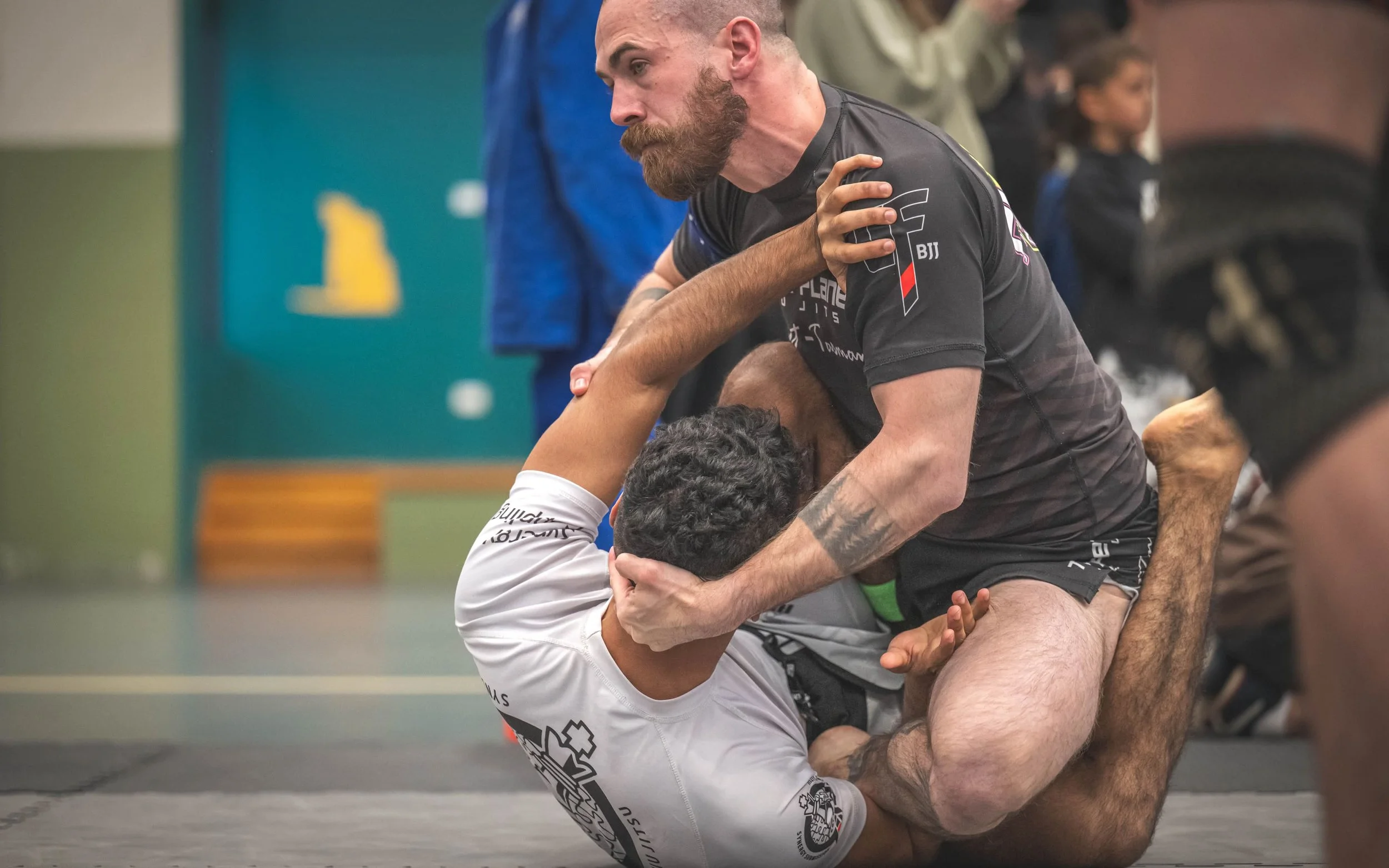 Coach Josh on the mats at a BJJ tournament