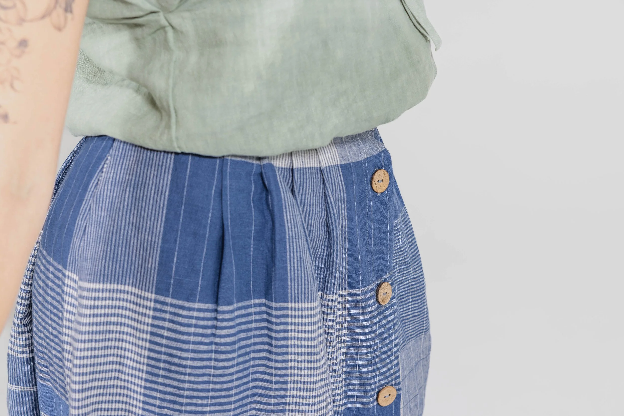 Foxlilie-womens-thomas-skirt-cornflower-plaid-lifestyle-front-details.jpg