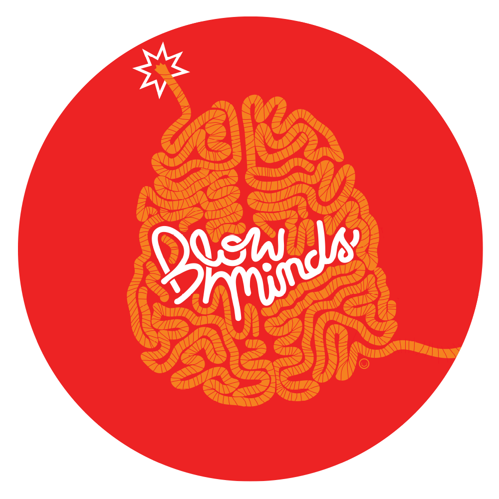 A graphic illustration of a brain with a fuse at the top, resembling a lit bomb, with the words "Deli Minds" written across the brain and a red background.