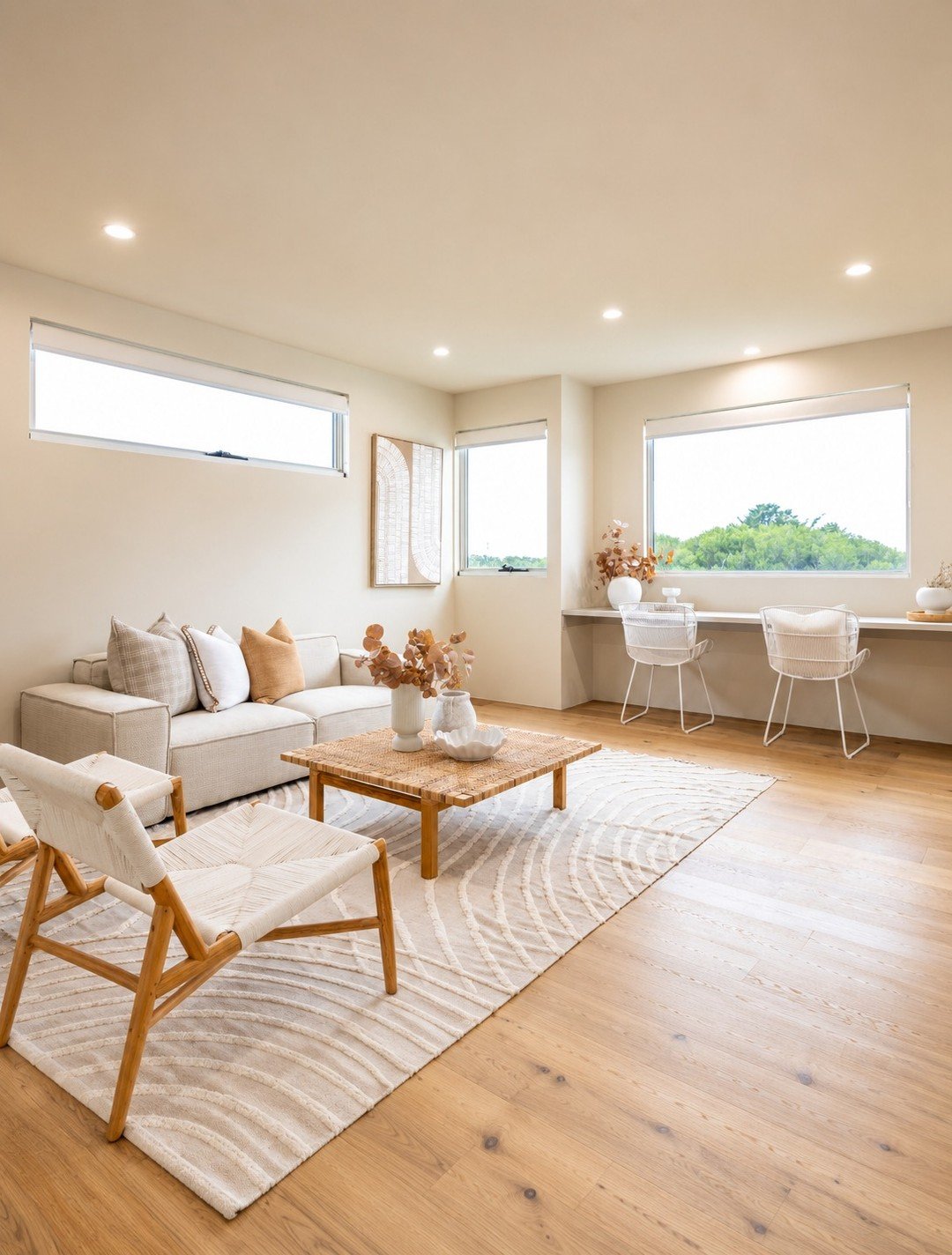 Look at how much breathing room this space has.

Not because it is oversized.

Because it is designed to feel open, calm, and connected to what is outside.

Upstairs, this living area gives everyday life room to unfold.

Generous windows bring in nat