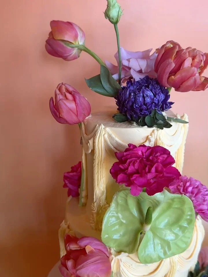 Taurus birthday magic for @danaisabellaaa 🌸 happy birthday love bug! Fluffy coconut cake with passionfruit buttercream and passion curd. She&rsquo;s colorful and full of life, just like our new bestie. 
.
.
.
.
.
.
#cakedecoration #805eats #venturaf