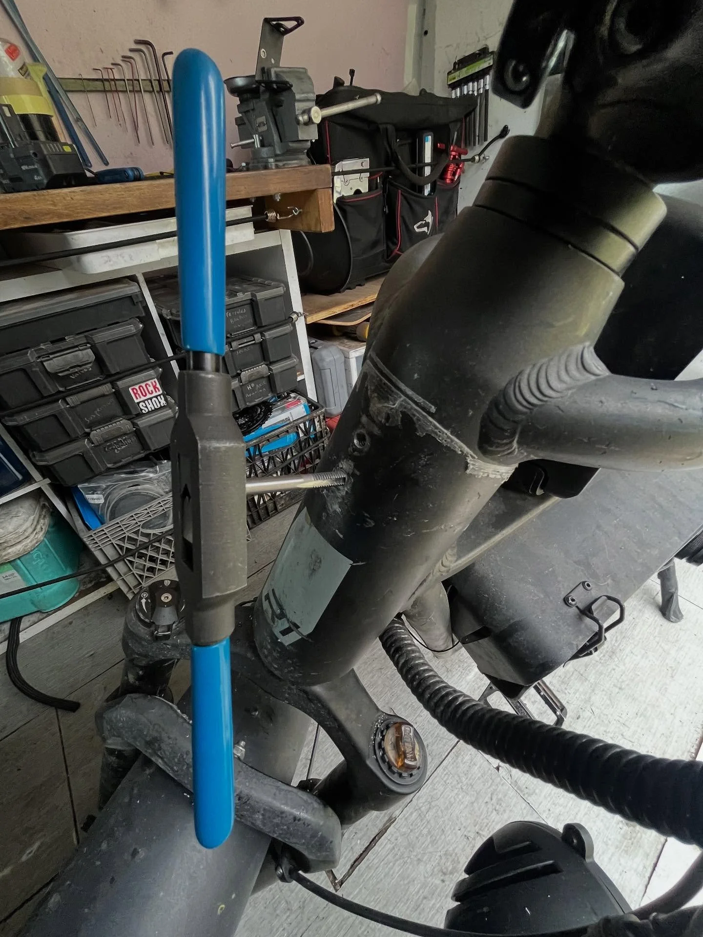 Better Than New: the headlight on this bike kept coming loose and finally one of the bolts snapped. Not only did I remove the bolt, but I also drilled out the factory holes and increased the bolt size from 4mm to 5mm. It should be Rock solid from now