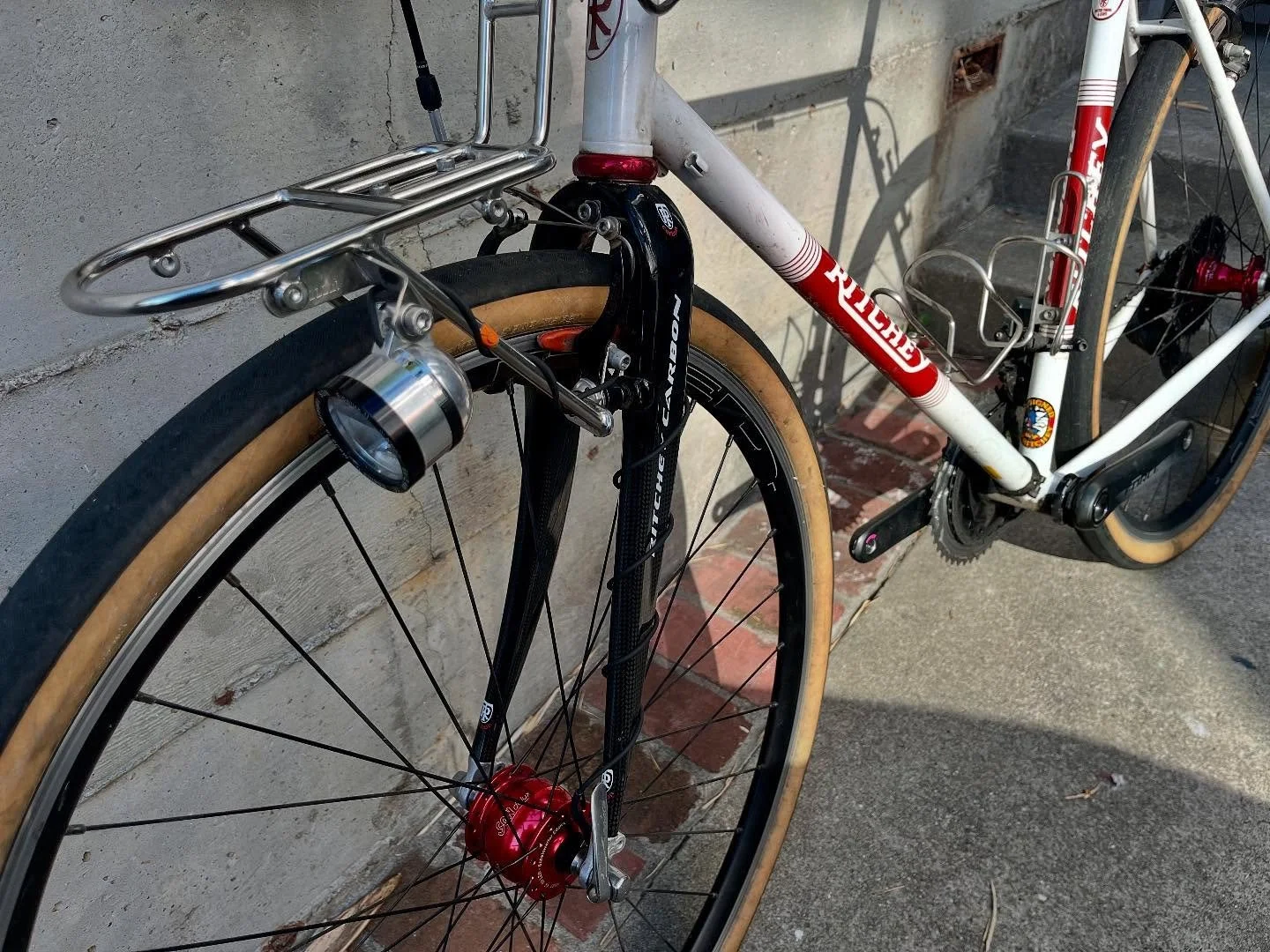 Dynamo hub: generator hubs are super cool, unlimited energy as long as youre moving. I installed a front wheel with dynamo hub and a cargo rack to to hold the headlight on this Ritchey Breakaway frame. Very interesting bike, it has lugs that screw lo