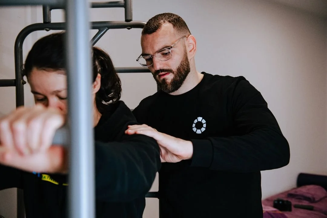 Osteopath performing active osteopathic treatment in a TrueStretch at Mixed Osteo, Kensington