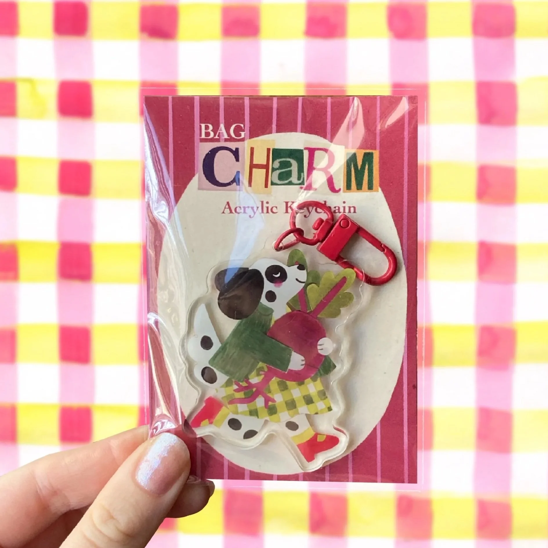 Dalmatian carrying a beetroot acrylic keychain