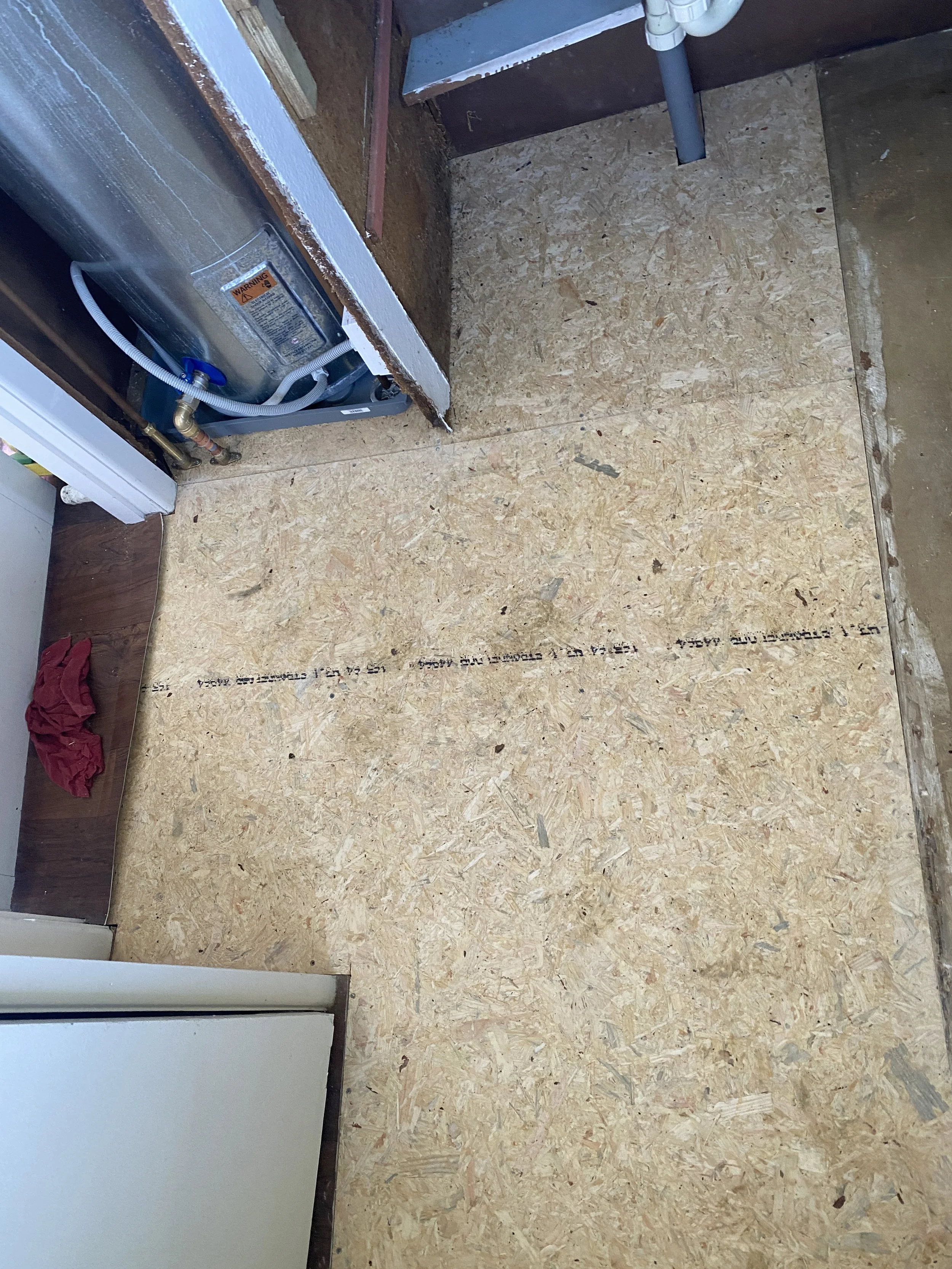 Laundry flooring replacement following leak damage in Central Auckland