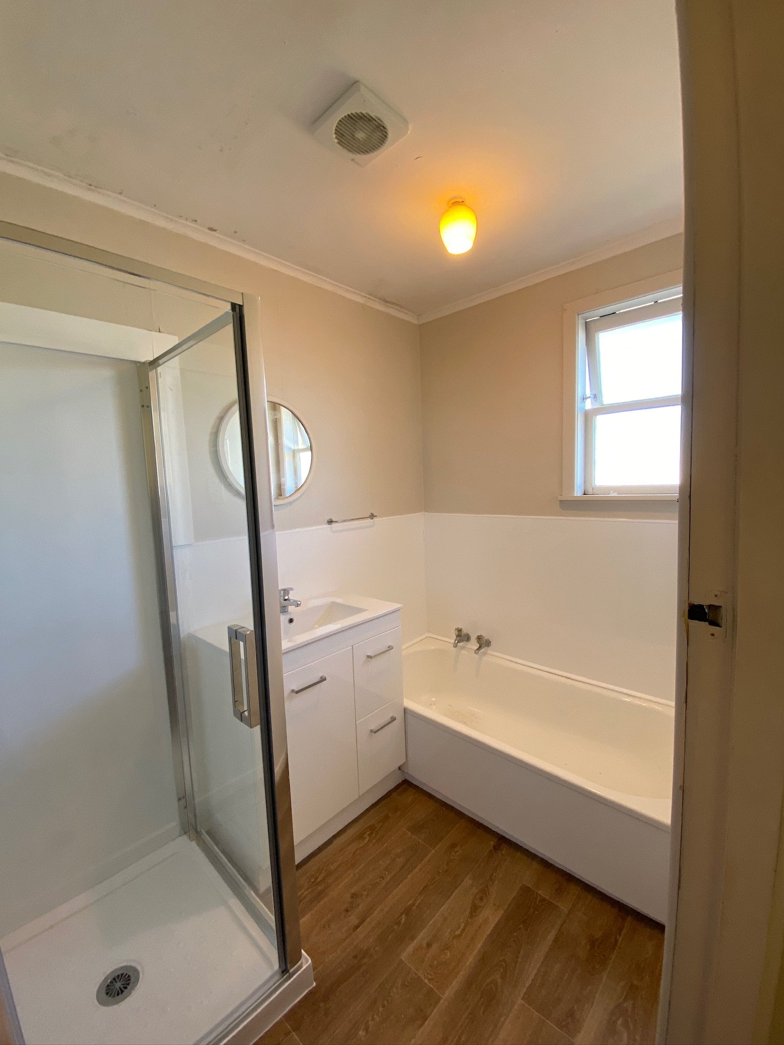 Bathroom refresh completed in Kelston Auckland with new shower, vanity, wall linings and vinyl flooring