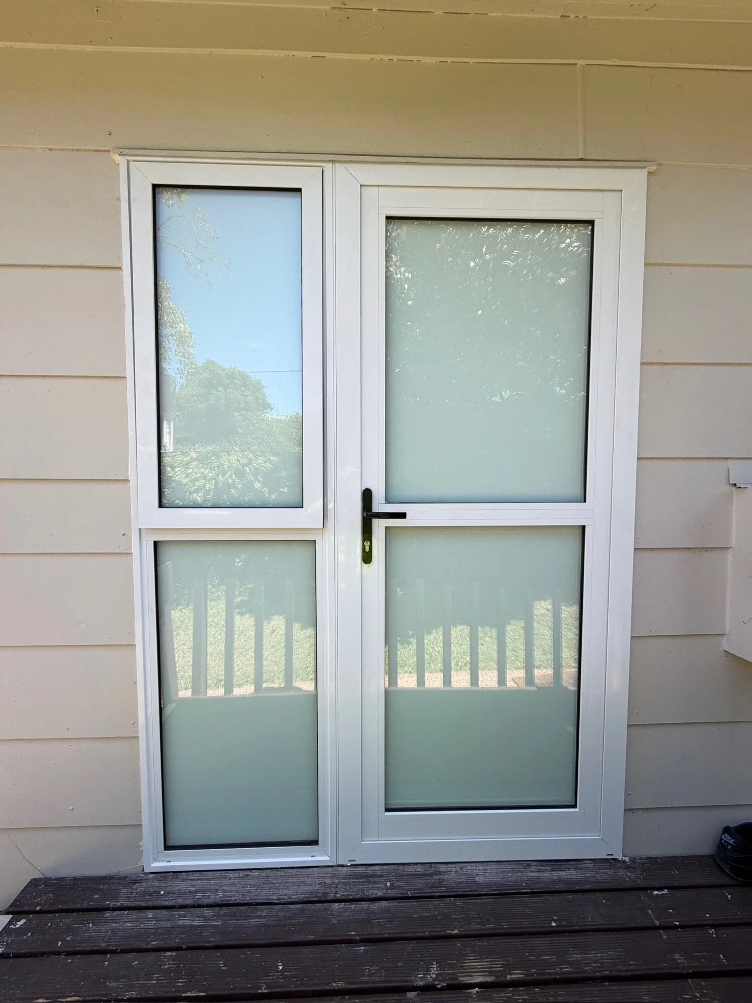Entrance door replacement completed at tenanted property in Auckland