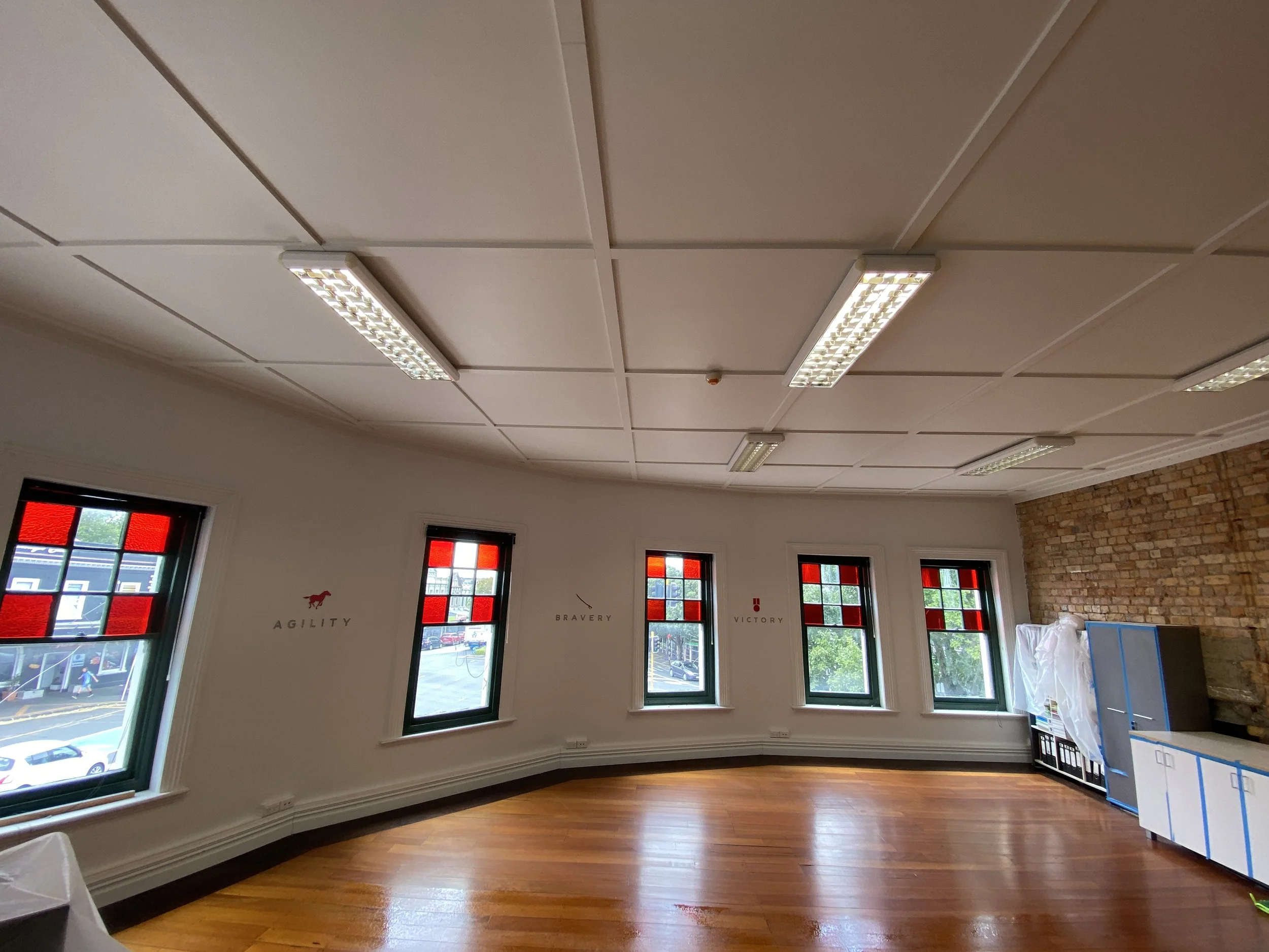 Repaint of water-damaged wall for Grafton office by DCW Services