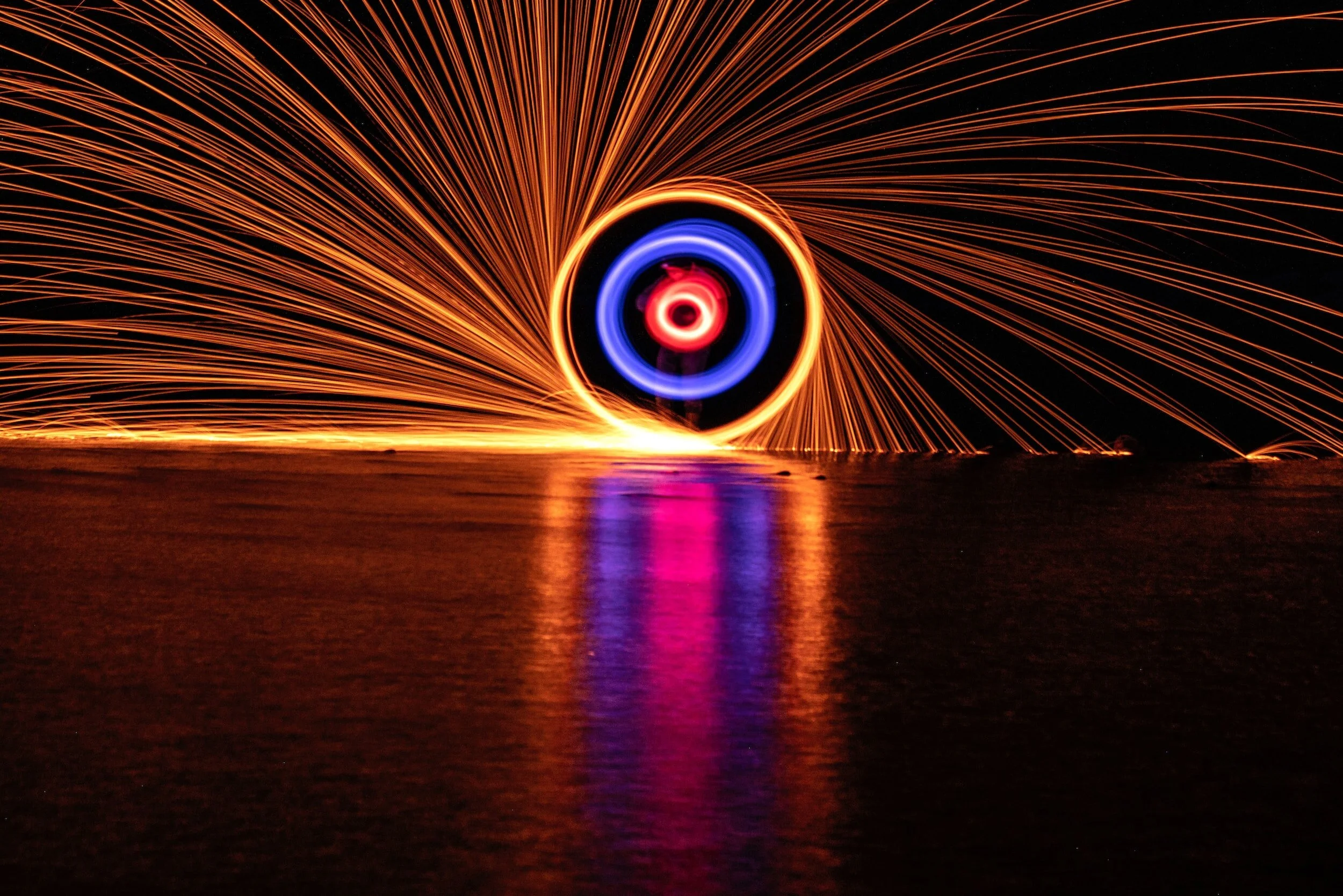 Our Values create impact like this Catherine Wheel reflected on the water