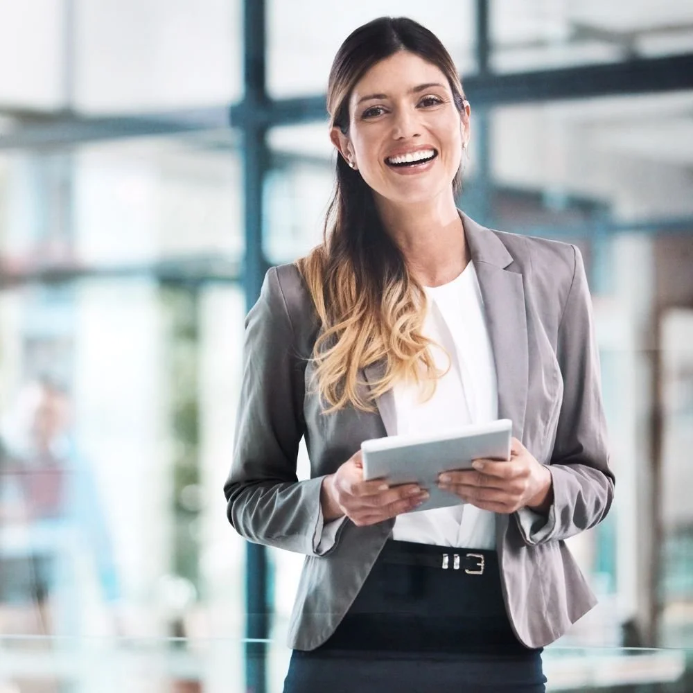 A smiling young business woman on an event assistant apprenticeship