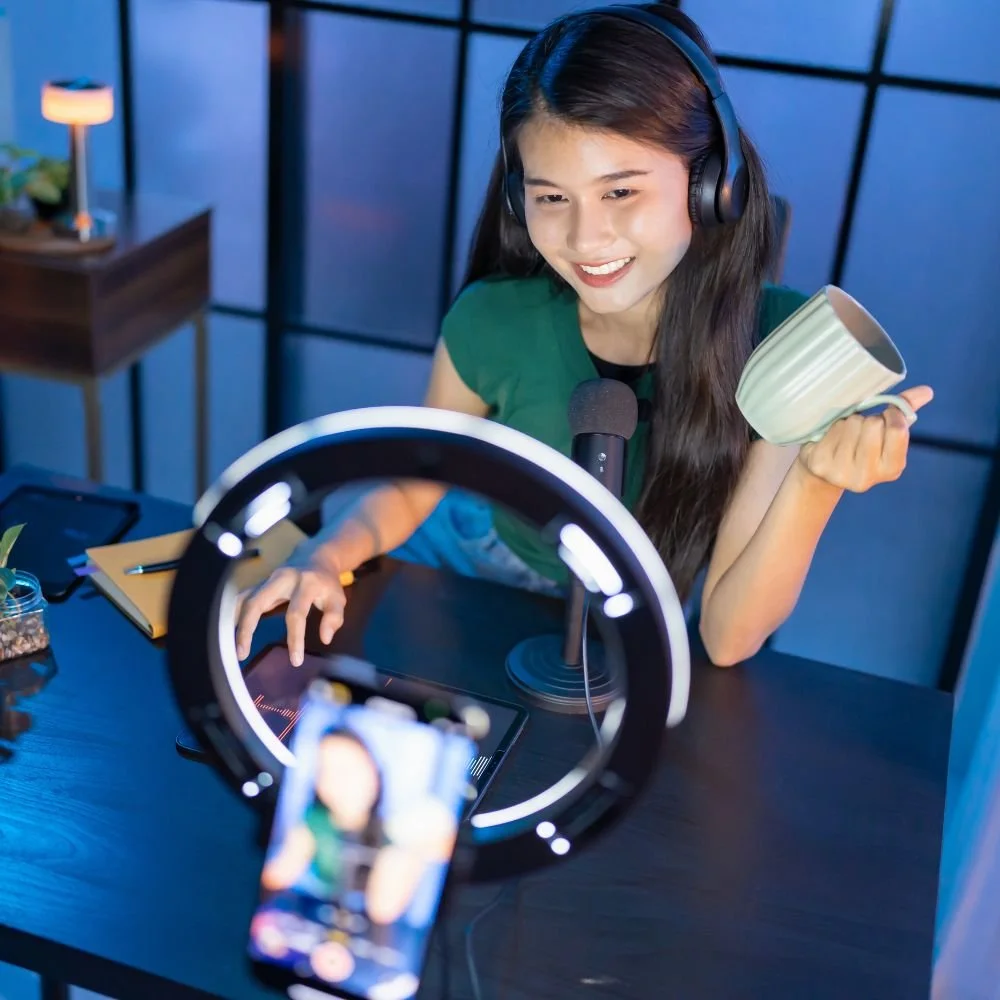A young girl recording content at her desk for her Content Creator Apprenticeship
