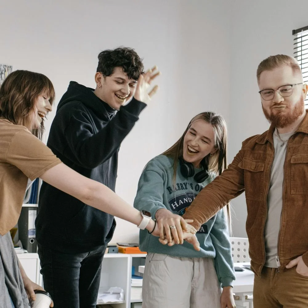 Teamwork training for employee development in progress with 4 colleagues