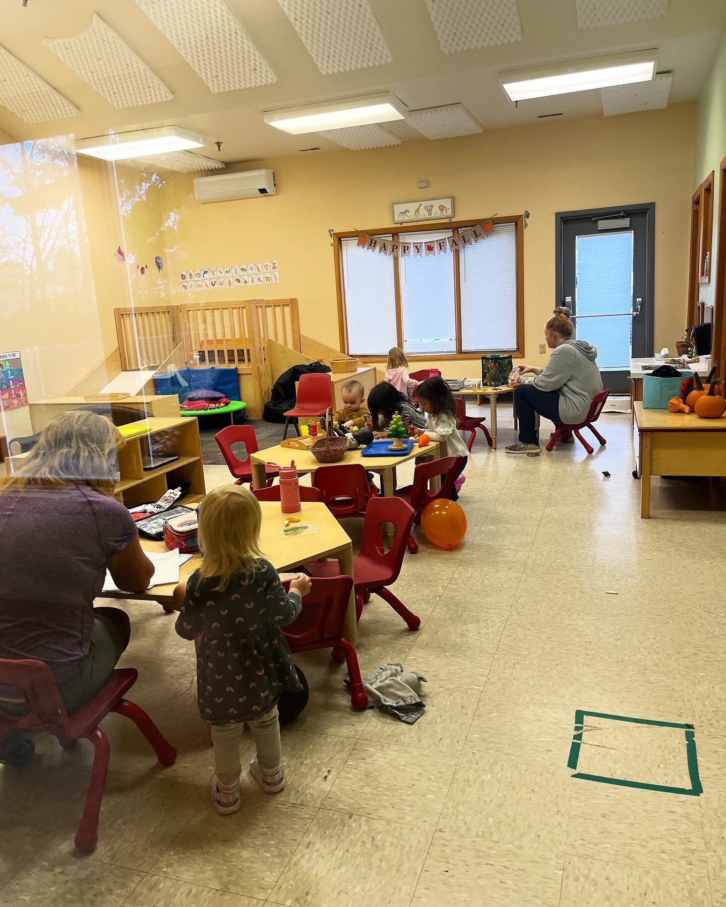 Even though we&rsquo;re peeking through a window, we can so easily see our toddlers all engaged during their morning work cycle. Look how engaged they all are!