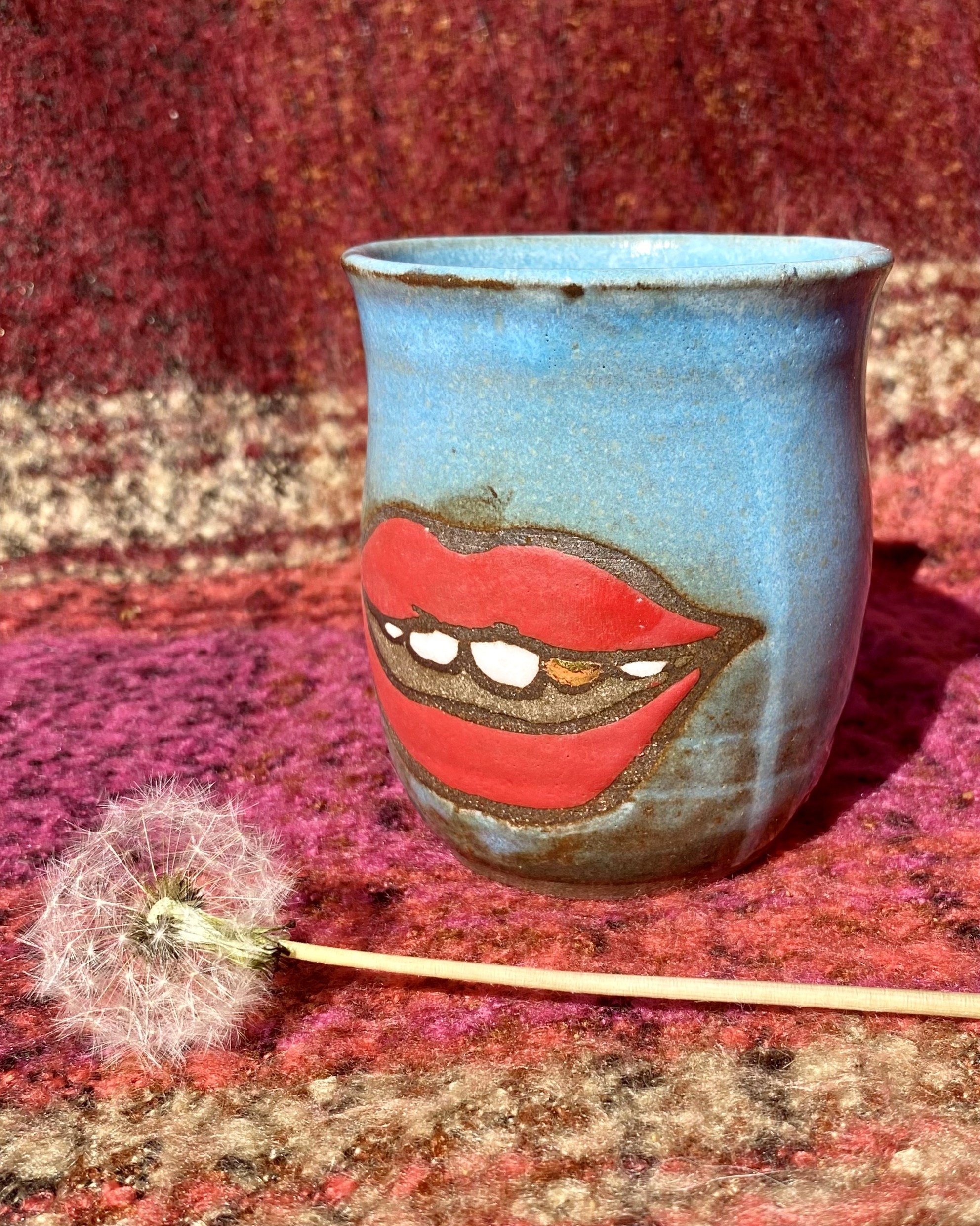 fat lip gold tooth mug