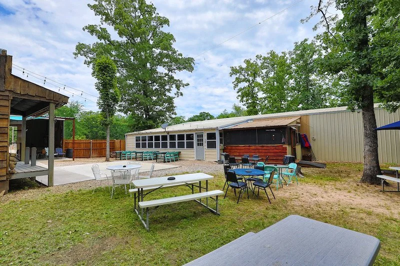 Outdoor seating and backyard view at Lakeside Bar and Grill near Hugo, Oklahoma
