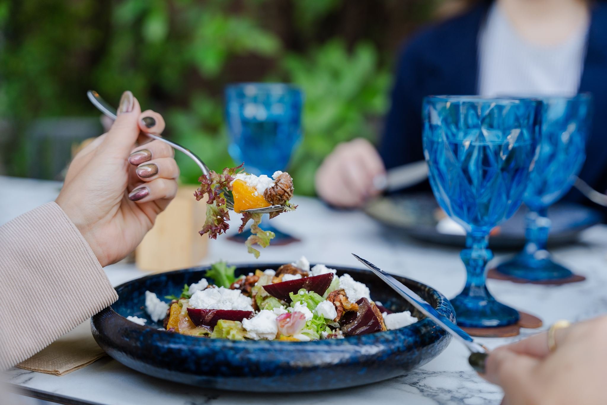 Fresh Andrássy Garden salad with seasonal beetroot, walnuts, fig and orange, served with goat cheese crumbles.