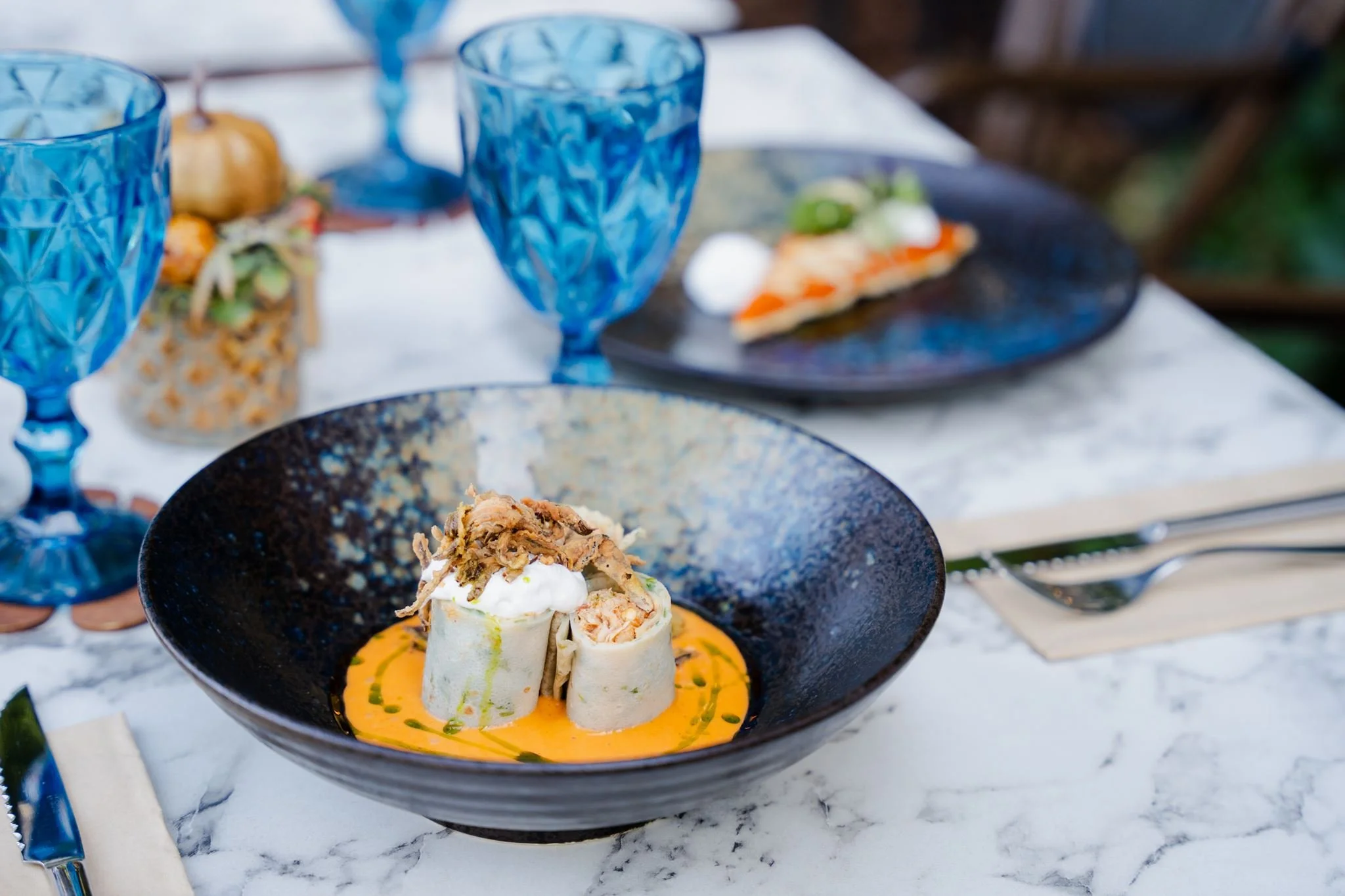 Traditional Hungarian 'Hortobágyi' crepes, stuffed with meat and served with pepper foam.