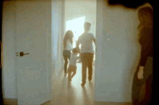 A young family running through the house taking at home photos on their farm