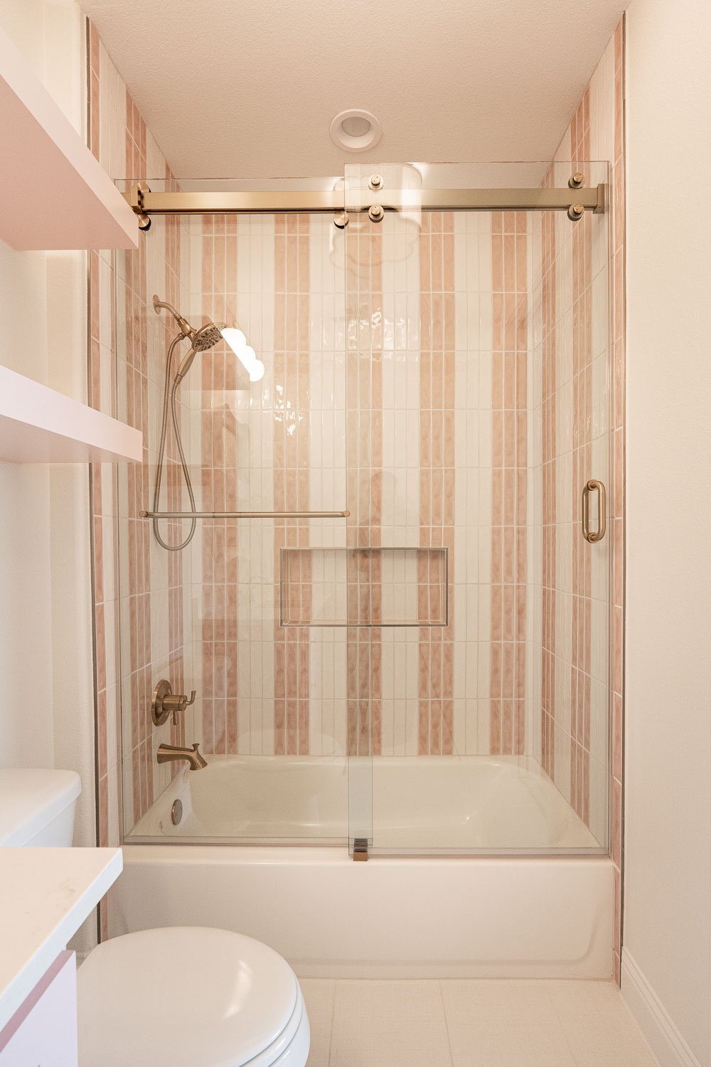 Bathroom interior design to match pink cabinets.